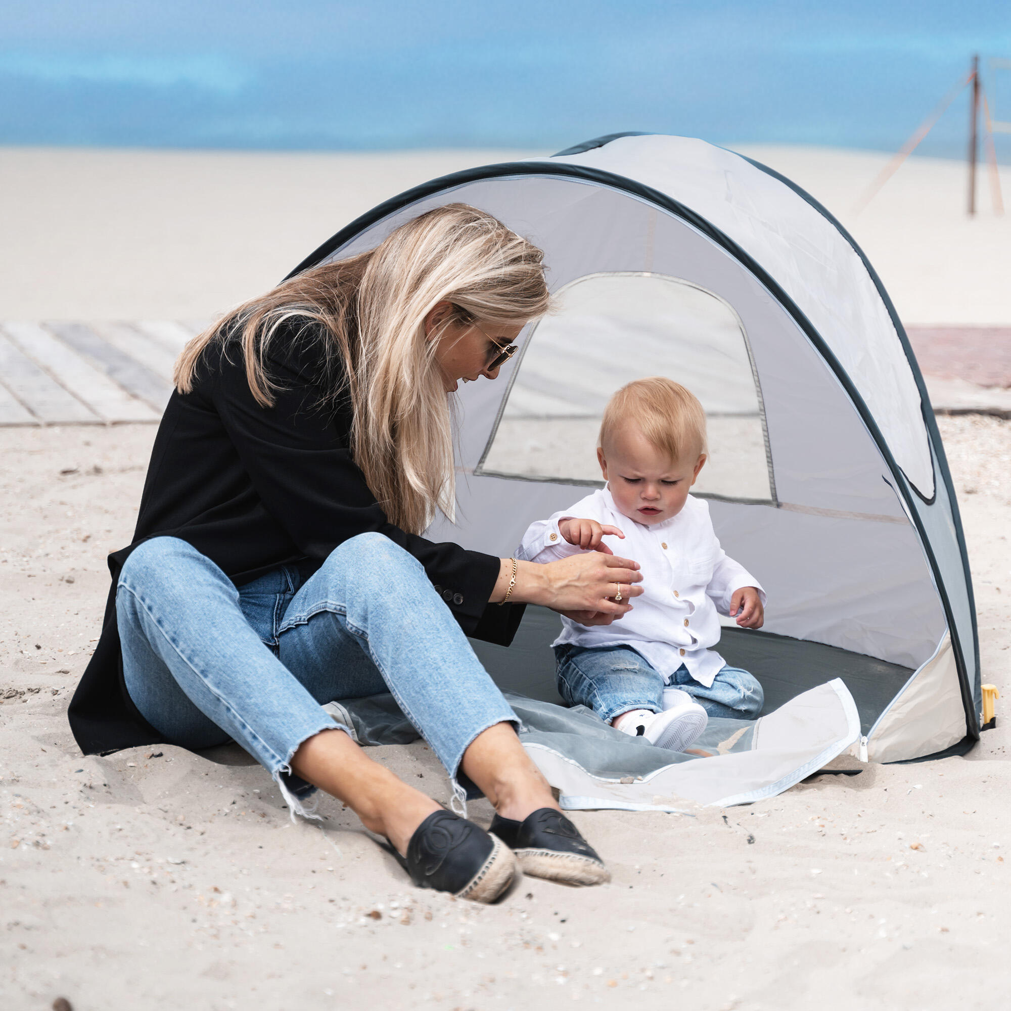 tenda-spiaggia-decathlon-101poe-1.jpg Tenda da spiaggia Pop Up di Lusso Leggera Protezione UV 50+ Argento | Decathlon - immagine 1