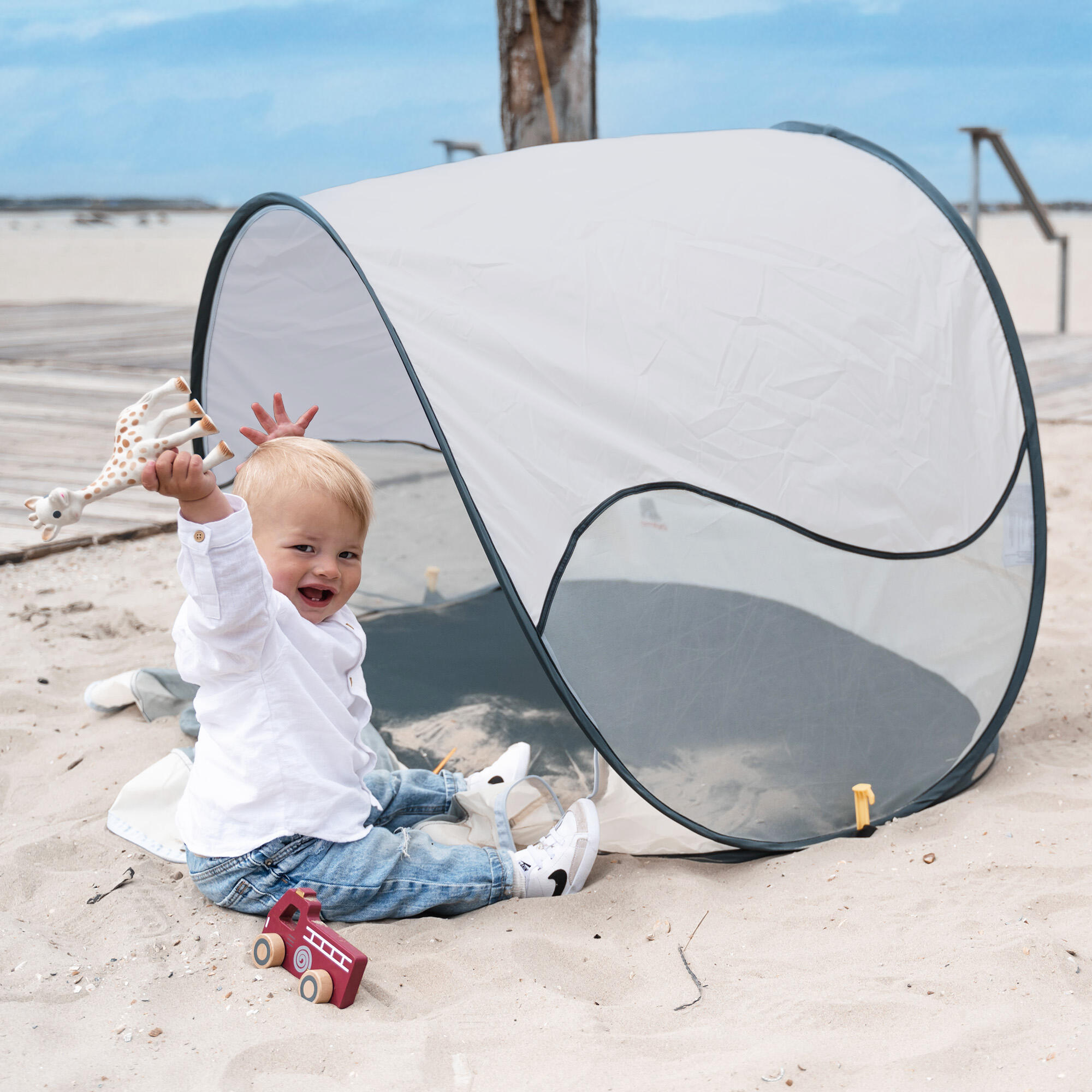 tende-per-spiaggia-decathlon-228uwr-2.jpg Tenda da spiaggia Pop Up di Lusso Leggera Protezione UV 50+ Crema - immagine 1